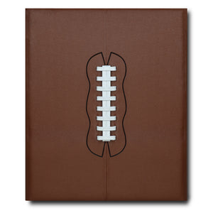Front cover of coffee table book titled "American Football, The Impossible Collection"