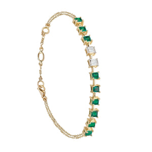 Diamond, emerald and yellow gold adjustable chain bracelet.