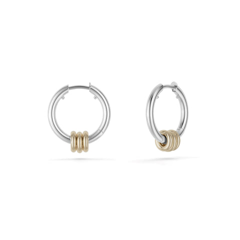 Ghost image of a pair of Spinelli Kilcollin sterling silver mini hoop earrings that feature three 18k yellow gold annulets. 