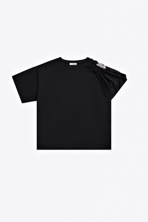 Black t-shirt with a crystal detail on the shoulder on  a white background