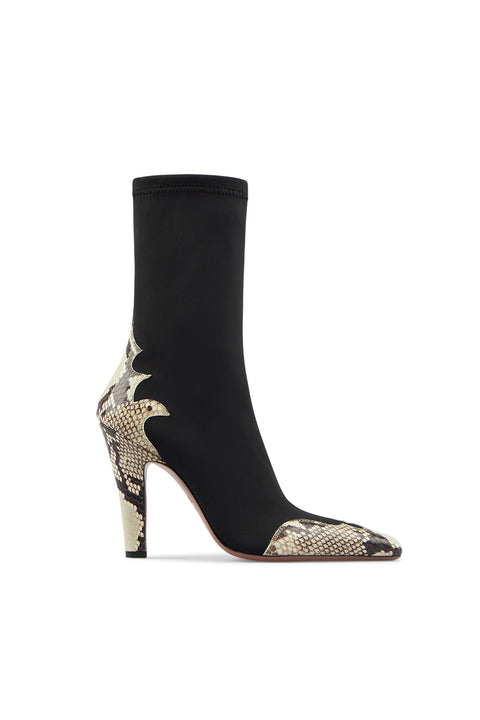 Black sock boot with snake print heel on a white background