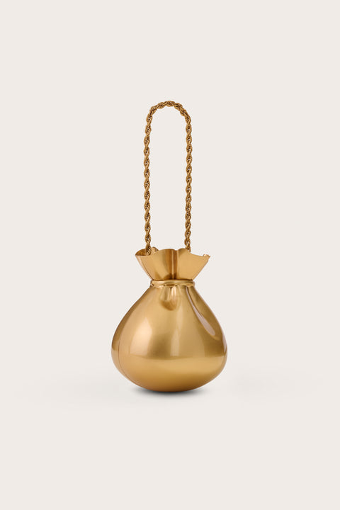 back of a gold-toned sculptural pouch clutch that features a twisted rope metal chain. 