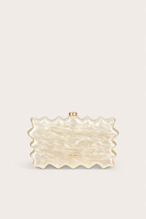 A wavy, rectangular clutch made of pearlized acrylic, featuring gold hard wear. 