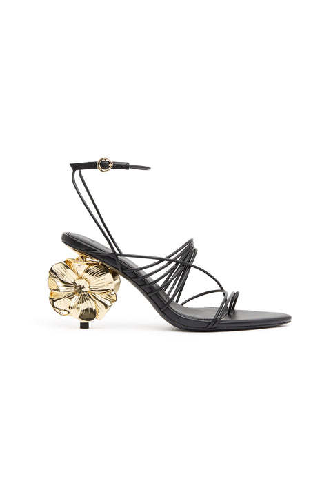 Black strappy heel with sculptural flower heel.