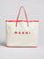 Janis tote bag in medium size with red leather straps and piping.