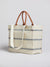 Back of the marni tote with brown leather straps.