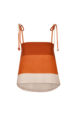 Flat lay of front of orange and white gradient striped top with corded straps on a white background