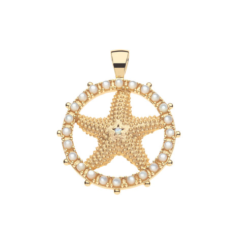 Gold starfish cutout pendant with pearl accents on a white background