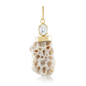 Gold pendant with aquamarine and coral on a white background