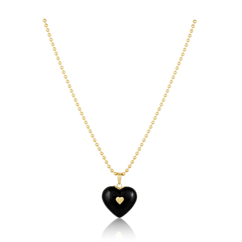 Necklace with a black heart-shaped pendant and gold heart detail on a white background