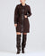 Model wearing the brown jayda dress with leather trim and zipper down the front.