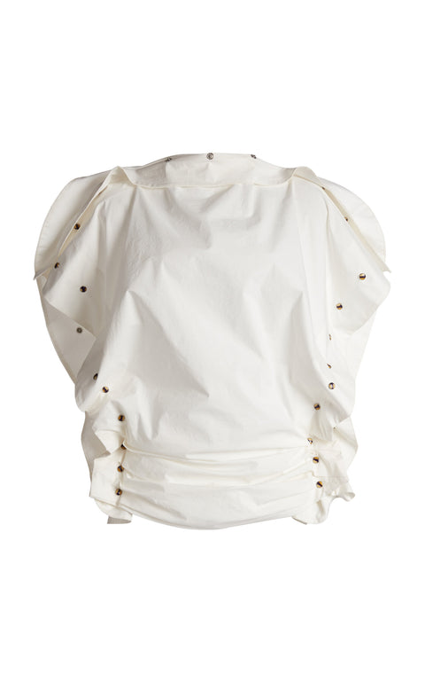 White tank top blouse with puff sleeves and decorative elements on a white background