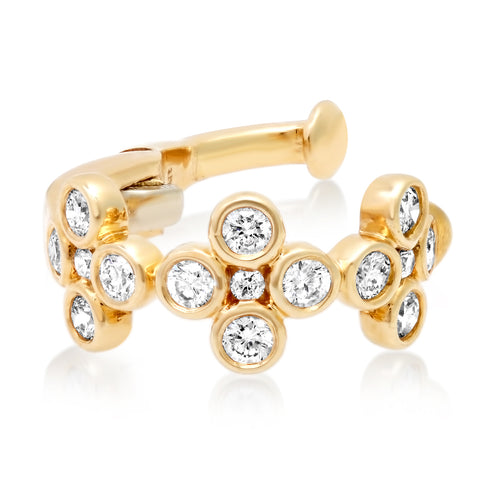 Yellow gold ear cuff with blossom shaped bezel diamond detail