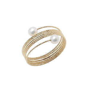Close-up image of the wire ring with pearls